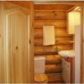 How to properly make a bathroom in a wooden house The floor and walls of a bathroom in a wooden house