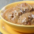 Meatballs with gravy in a frying pan