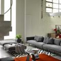 A gray sofa in the interior is always useful